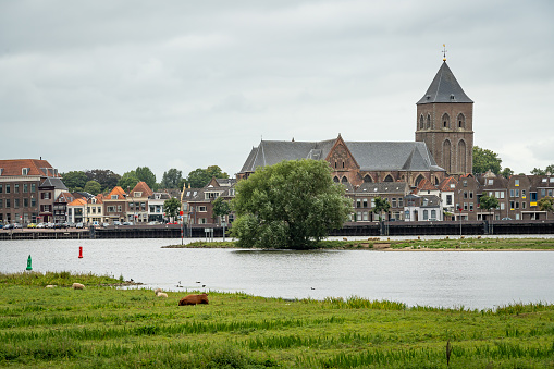 Church in the city of Kampen seen from the banks of river Ijssel