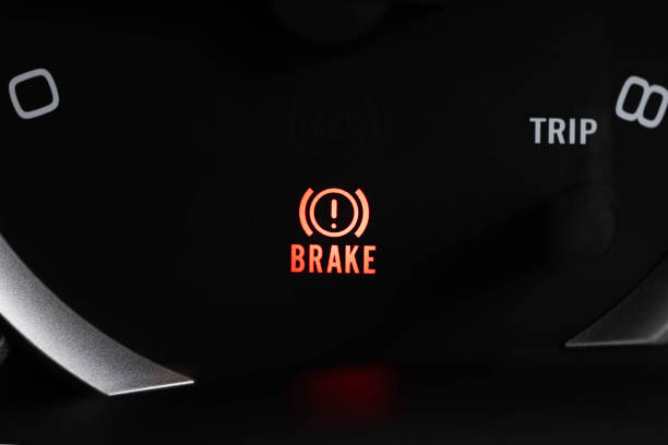 Brake light signal icon on the car panel, Photo close-up. Brake light signal icon on the car panel, Photo close-up. brake stock pictures, royalty-free photos & images