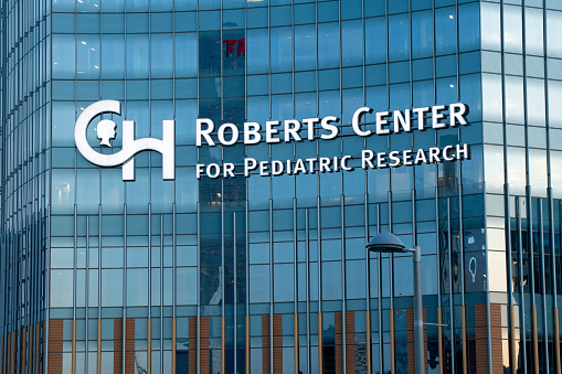 Philadelphia, USA - May 29, 2022. Modern building of Roberts Center for Pediatric Research by Schuylkill River in Philadelphia, Pennsylvania, USA