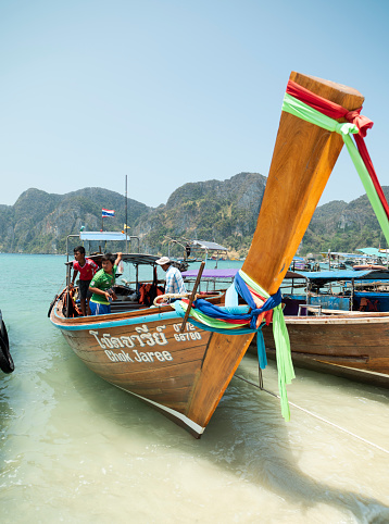 Ton Sai Beach, Krabi, Thailand. 28 March 2016. Traditional excursion boats on Ton Sai Beach.