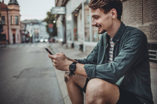 istock Young hipster man on the streets 1418834273
