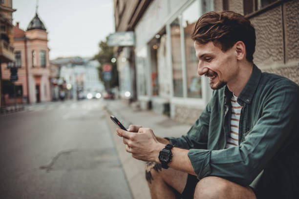 istock Young hipster man on the streets 1418834352