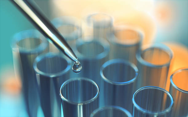 Close up of examining of test sample Close up of examining of test sample test tube stock pictures, royalty-free photos & images