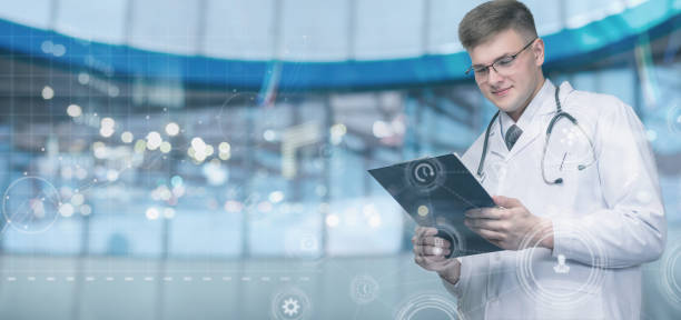 istock Medical specialist works on a virtual computer screen . 1418838683