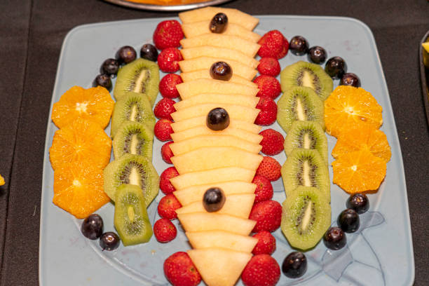 istock shale stone board with various fruits for a feast 1418842054