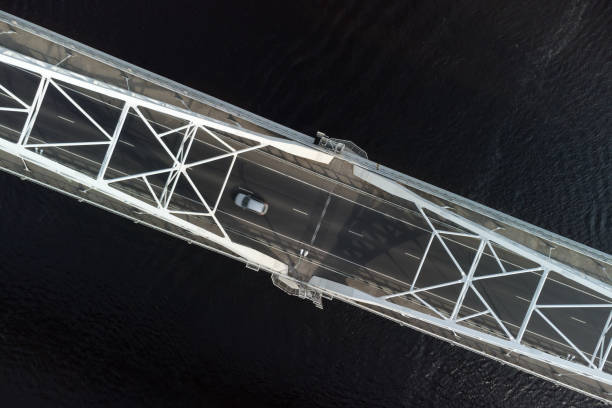 istock Road bridge over the river, filmed on a copter. 1418843673