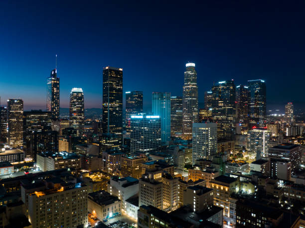 Aerial View of Downtown LA at Night Aerial view of Downtown Los Angeles at night, looking towards the skyscrapers of the financial district from over the Historic Core. cityscape stock pictures, royalty-free photos & images