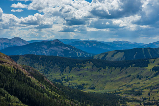 istock Green mountain valley with distant ski area 1418844899