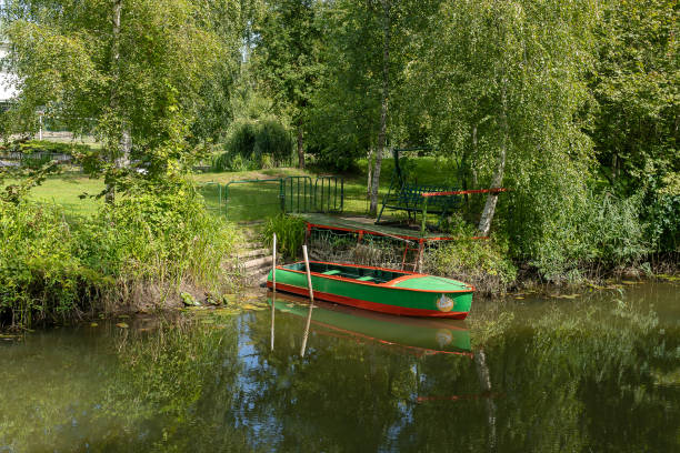 istock Small boat in private pier in the park. 1418845653