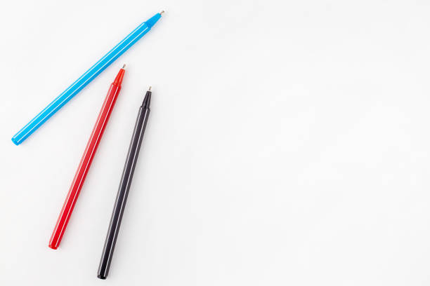 istock Colored pens lie on a white background concept. Education. Background. School. Isolated 1418848858