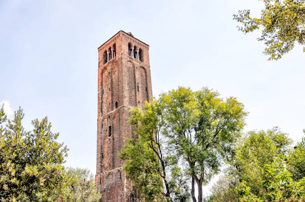 istock A bell tower seen through the trees in Murano Italy 1418850553