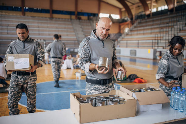 istock Soldiers preparing donations for civilians 1418851555