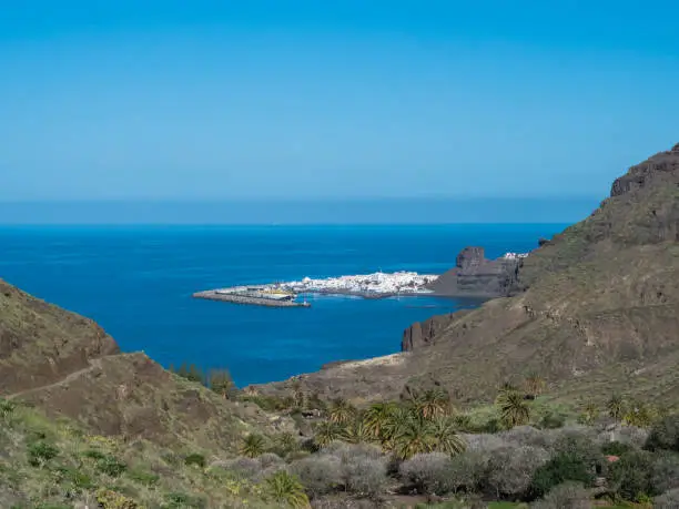 Photo of Seascape view of Puerto de las Nieves, traditional fishing village port with cliffs and rocky atlantic coast in the north west of Gran Canaria, Canary Islands, Spain.