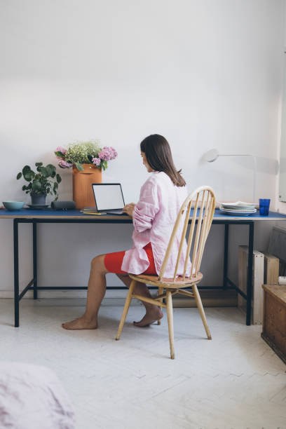 istock An Unrecognizable Beautiful Businesswoman Typing On Her Computer While Working From Home 1418854734