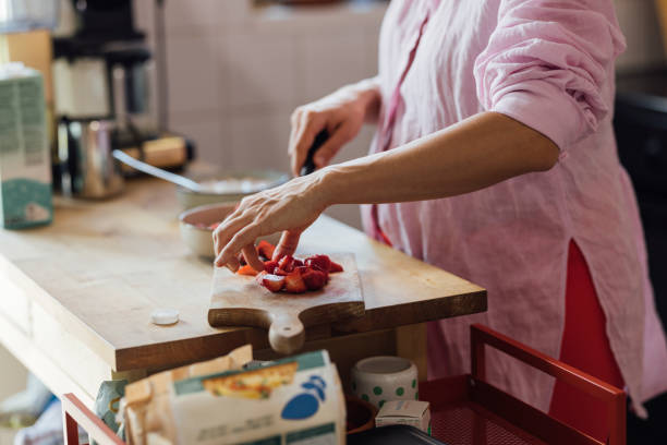 An Unrecognizable Woman Preparing Some Healthy Snack With Fruit