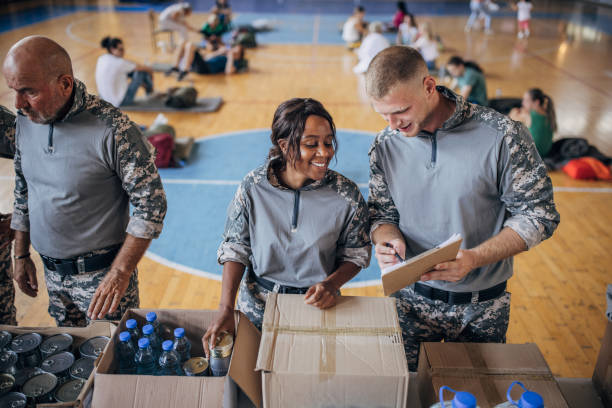 istock Soldiers preparing donations for civilians 1418856117