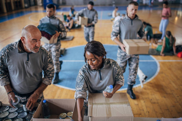 istock Soldiers preparing donations for civilians 1418856201
