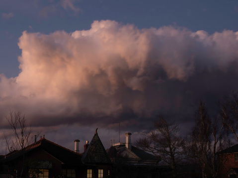 Storm cloud over houses at dusk Ballarat