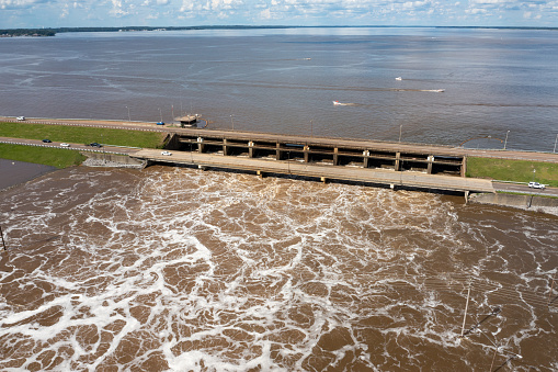 Jackson, MS - August 28, 2022: The Ross Barnett Reservoir Spillway dam, that feeds the Pearl River, into Jackson, MS, with flooding due to high rain levels.