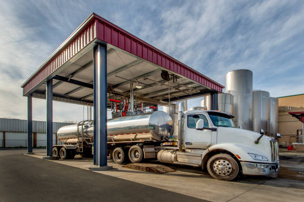 Tanker Truck Tanker truck at loading dock. fuel tanker stock pictures, royalty-free photos & images