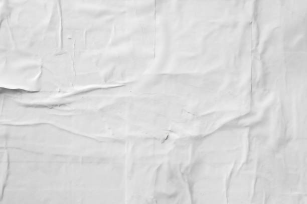 istock white crumpled and creased paper poster texture background 1418878941