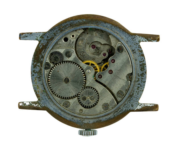A broken old mechanical watch mechanism. Isolate on a white background