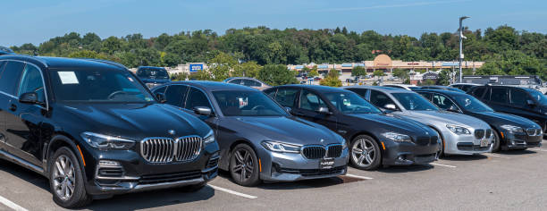 Used BMW cars for sale at a dealership stock photo