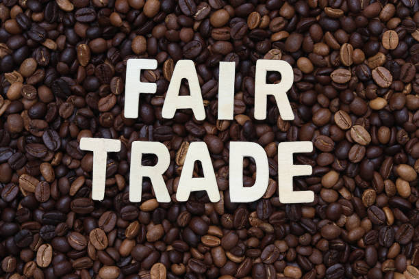 istock Fair trade word on roasted coffee beans background. 1418895932