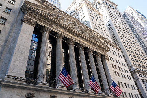 New York, NY, USA - August 19, 2022: New York Stock Exchange at wall street in New York, NY, USA, August 19, 2022, an American stock exchange in the Financial District of Lower Manhattan.