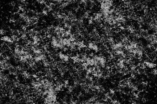 Seamless heavy grunge texture on a dark concrete wall surface