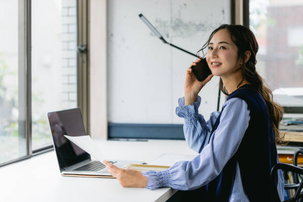 istock Working women making phone calls (home, telework, office) 1418919799