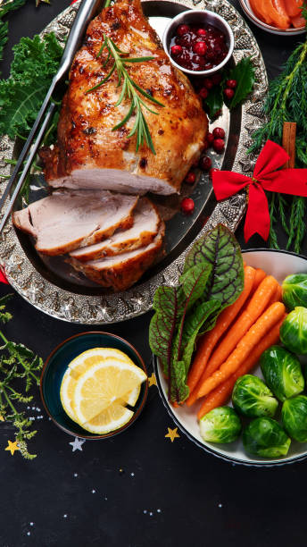 istock Traditional Christmas dinner on dark background. 1418929550