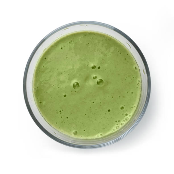 istock Green smoothie detox drink isolated on white 1418941034