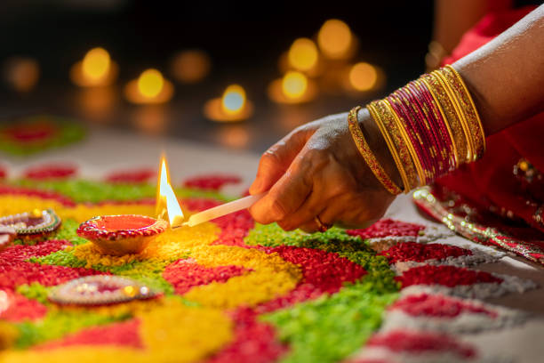 istock Traditional diya lamps lit during diwali celebration 1418942904