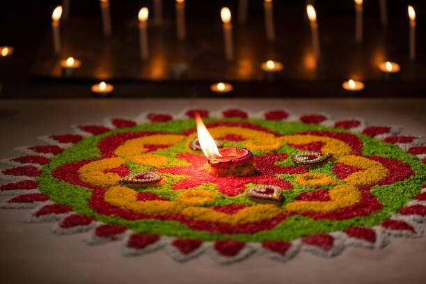 istock Traditional diya lamps lit during diwali celebration 1418942919