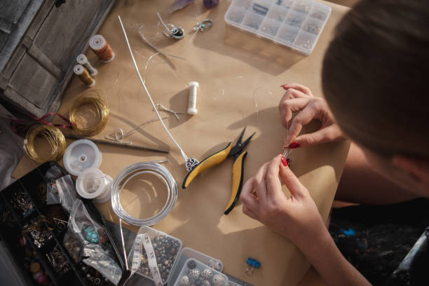 istock Making a DIY necklace from silver wire and crystal 1418954945