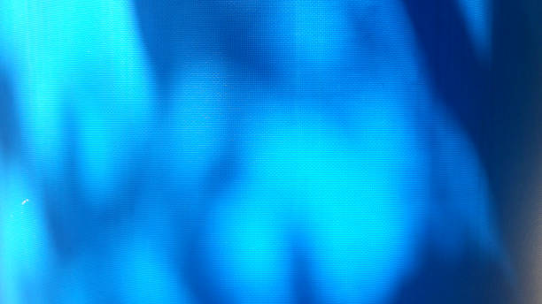 istock Tarp, shaded blue tarp. Background of strong, flexible, waterproof material. Canvas or polyester coated with polyurethane. Polyethylene, plastic. tree shadow on blue background 1418963238