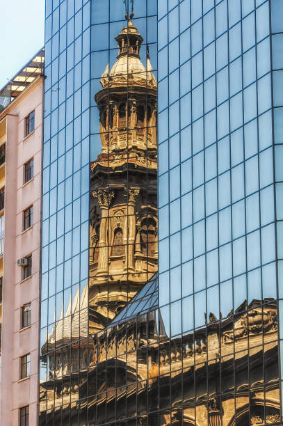 istock reflection of church tower on an office building 1418963927