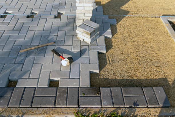 istock Laying paving slabs at a construction site. 1418965371