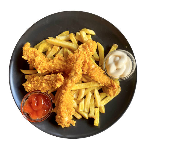 istock Crispy chicken strips with french fries 1418969573