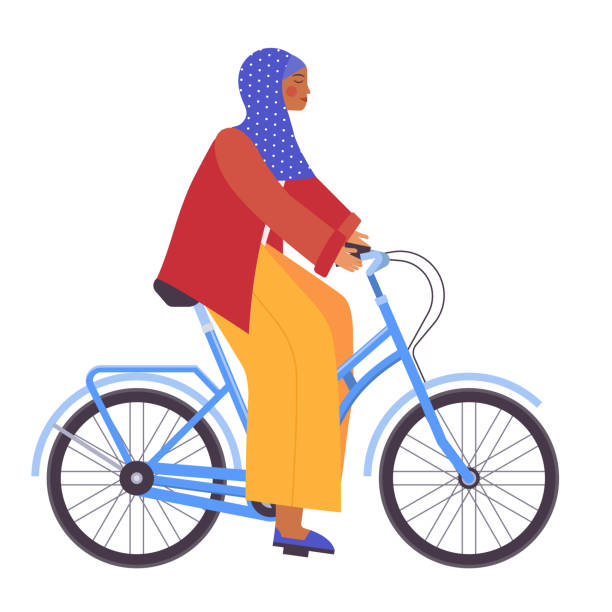 istock Arab Woman in Hijab Riding Blue Bicycle 1418970466
