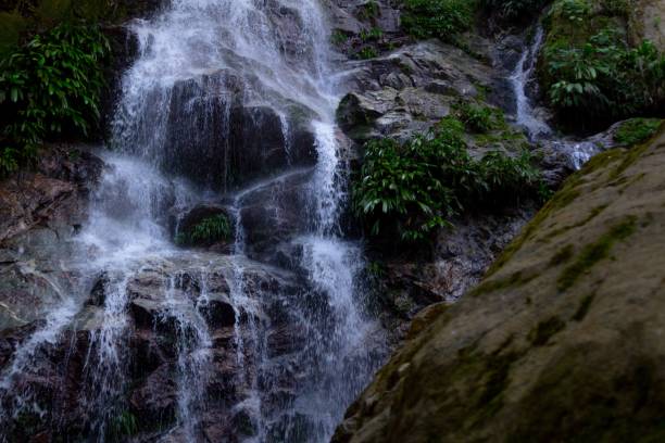 istock Beautiful shot of a waterfall stream 1418980572