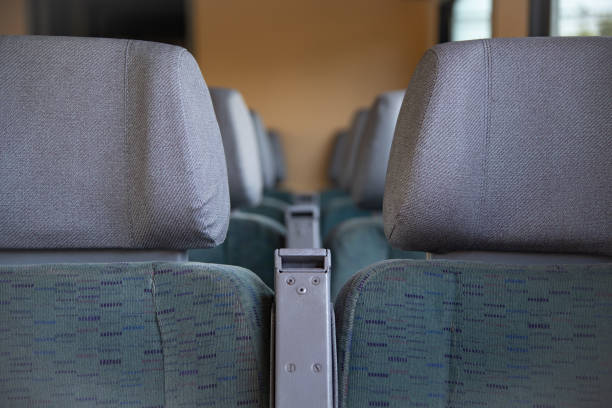istock Seating on the interior of a railway passenger car 1418980740