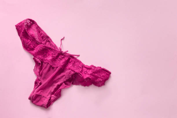 Panty on pink background stock photo