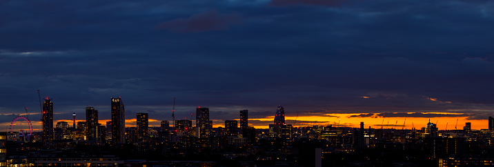 A scenic panoramic view of the Lambeth district including the Elephant and Castle area and the London Eye. BT Tower in the background and St Paul's on the right at the sunset as seen from South-East