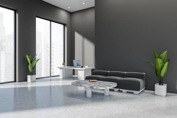 istock Business interior with relax area and workplace, panoramic window. Mockup 1418996367