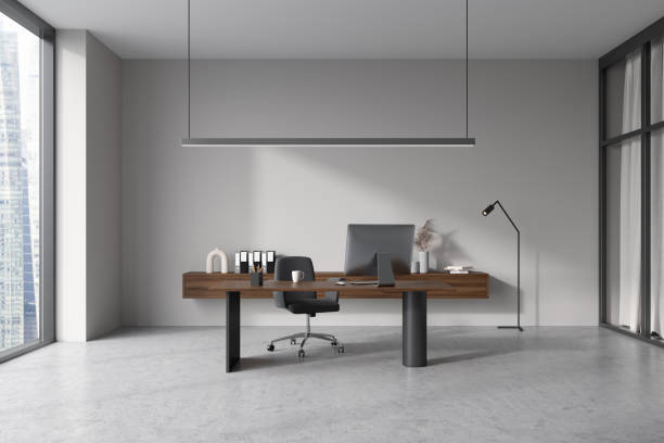 istock Light business interior with chair and work table, decoration and panoramic window 1418998979