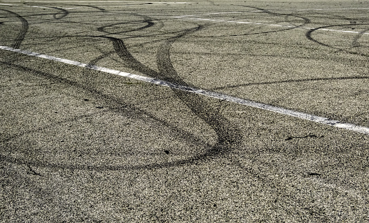 Detail of tire rubber marks, speed