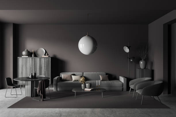 istock Grey relax room interior with eating table and couch with armchair, drawer 1418999459