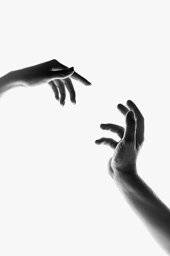Monochrome image of beautiful hands in different motion isolated on white background. Concept of feelings, community, care, support, symbolism, art. Copy space for ad